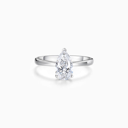 a pear shaped diamond ring on a white background