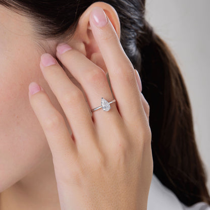 a close up of a person wearing a ring