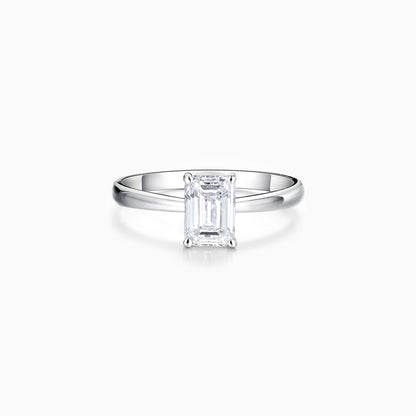 a white diamond ring on a white background