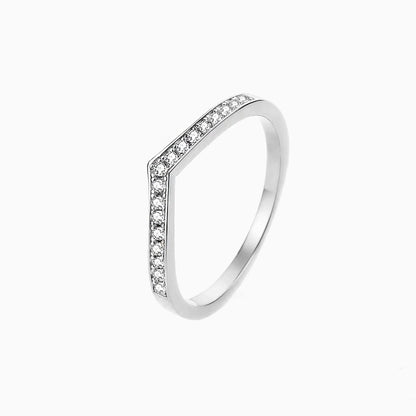 a white ring with diamonds on it