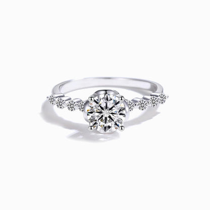 a white ring with diamonds on it