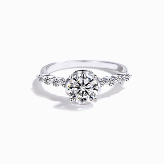 a white gold ring with diamonds on it