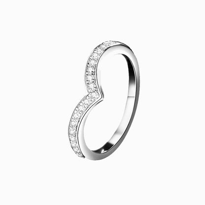 a white ring with diamonds on it