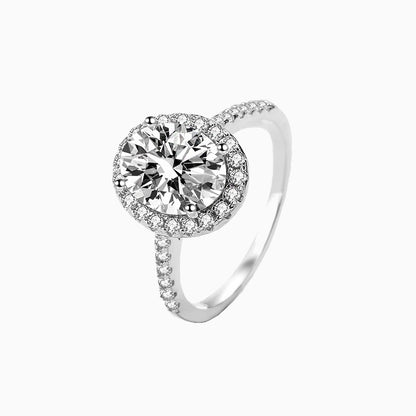 a white ring with a diamond center