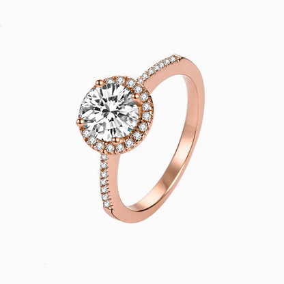 a rose engagement ring with a diamond center
