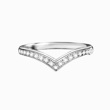 a white ring with diamonds on it