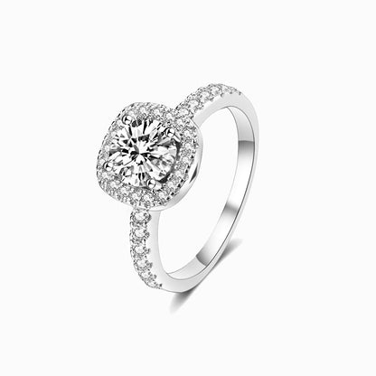 a white ring with a diamond center