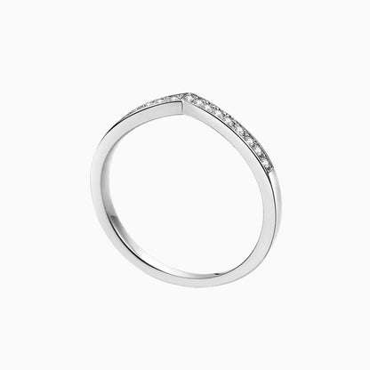 a white ring with diamonds on it