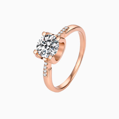 a rose engagement ring with a round diamond
