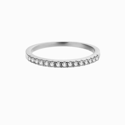 a white wedding band with diamonds