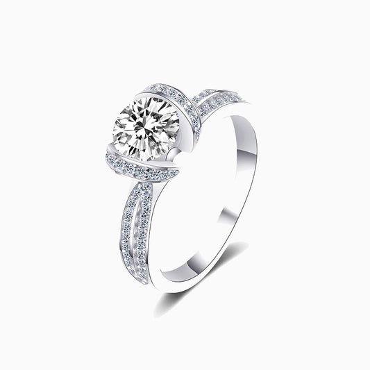 a white gold ring with a diamond center