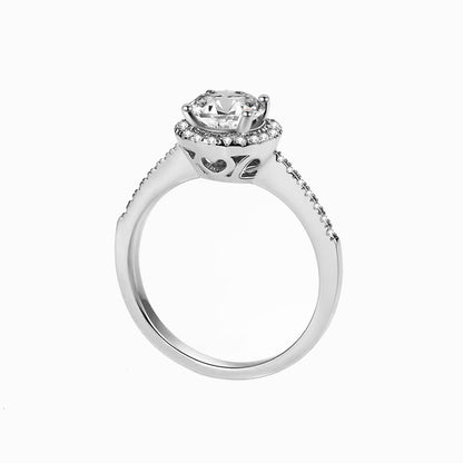 a white ring with a diamond center