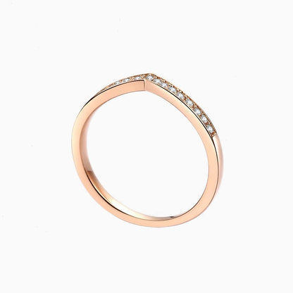 a rose ring with diamonds on it