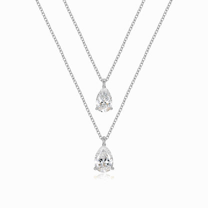 two necklaces with two pear shaped diamonds