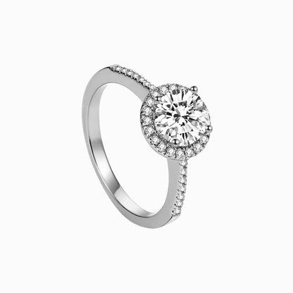 a white ring with a diamond center
