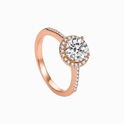 a rose engagement ring with a diamond center