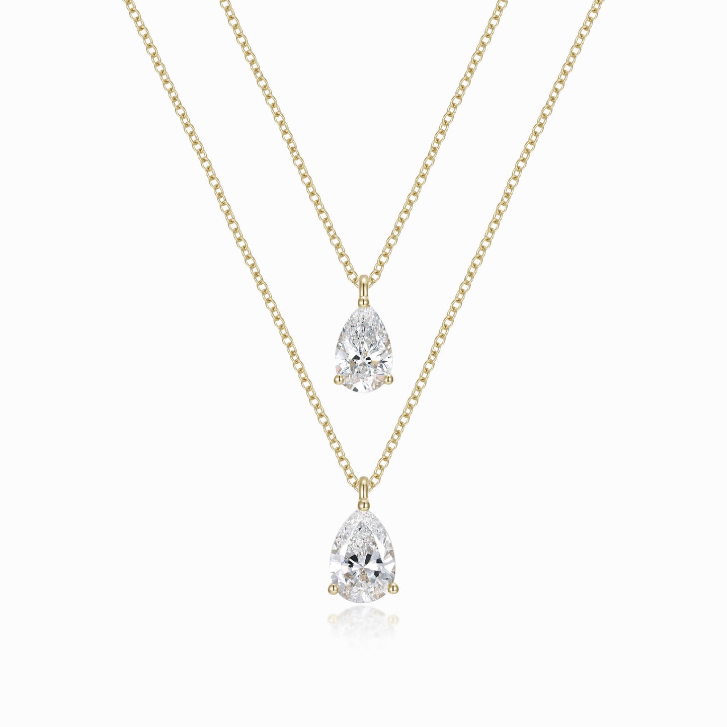 a necklace with two pear shaped diamonds on it