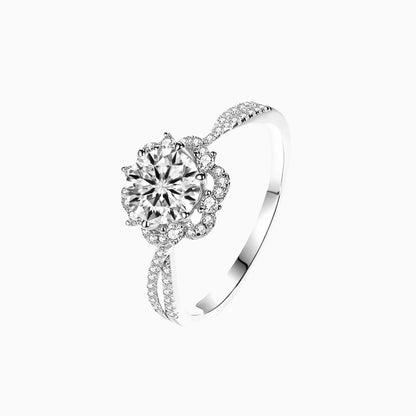 a white ring with a diamond center
