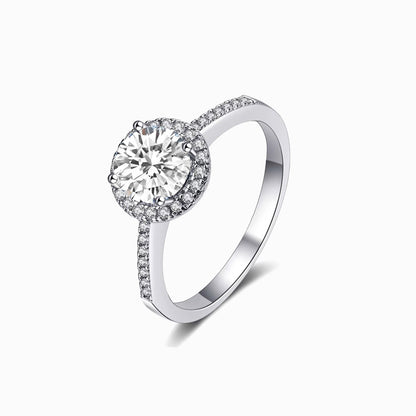 a white ring with a diamond center