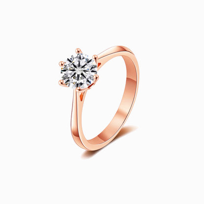 a rose ring with a single diamond