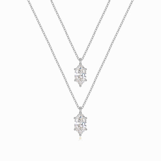 two necklaces with diamonds on a white background