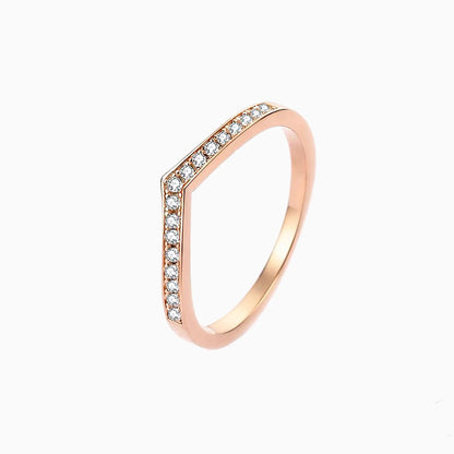 a rose ring with diamonds on it