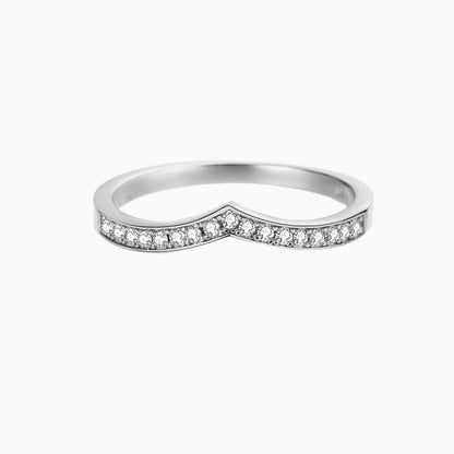 a white wedding band with diamonds