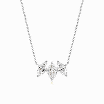 a necklace with three pears hanging from it