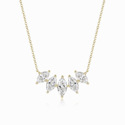 a necklace with three pear shaped diamonds